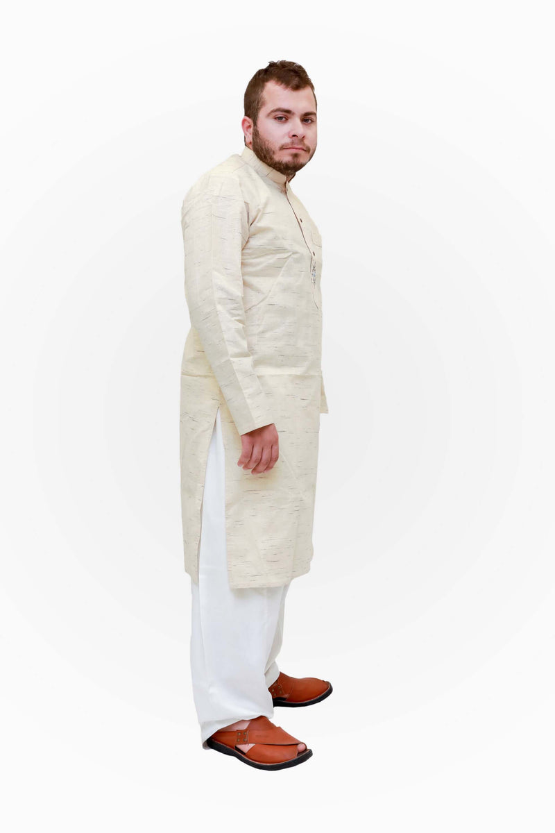 A light yellow cotton shirt with a pocket on the chest and minimal embroidery