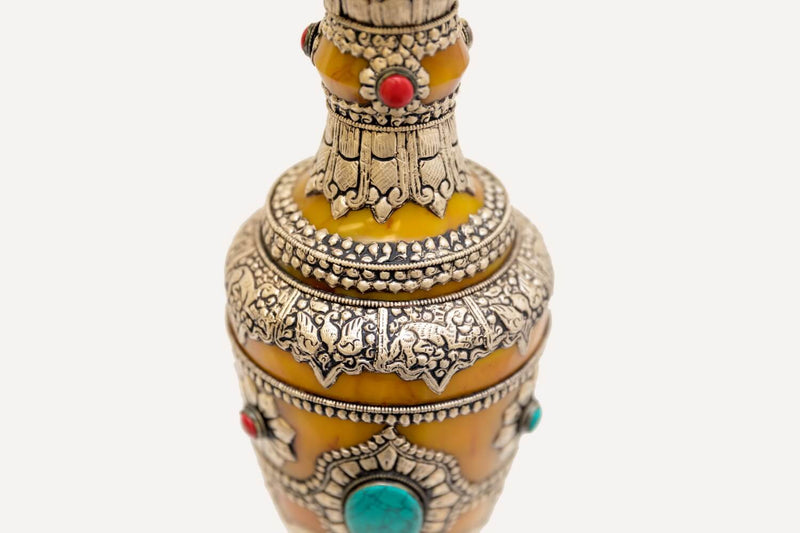 Amber Silver Vase With Turquoise & Coral Gemstones. This delicate hand made Carved vase is made in Nepal with real Amber and gemstones with Silver hand carving of the flowers and dears