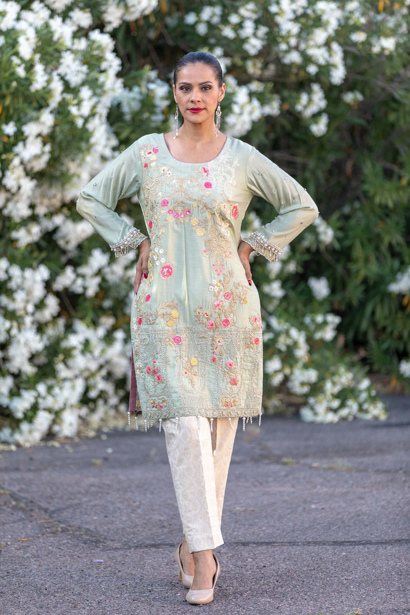 Pakistani girl in White and green dress