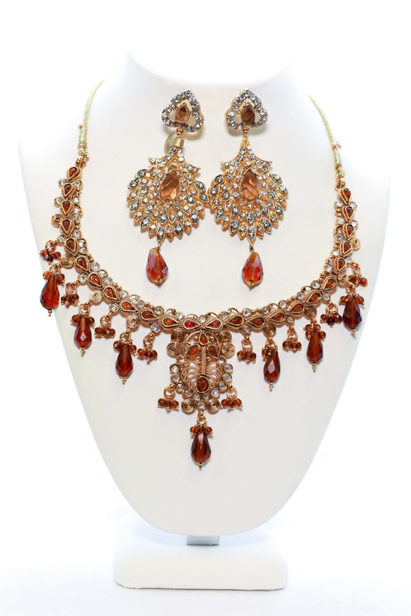 Golden Necklace and Earring Set with Red Stones - Trendz & Traditionz Boutique 