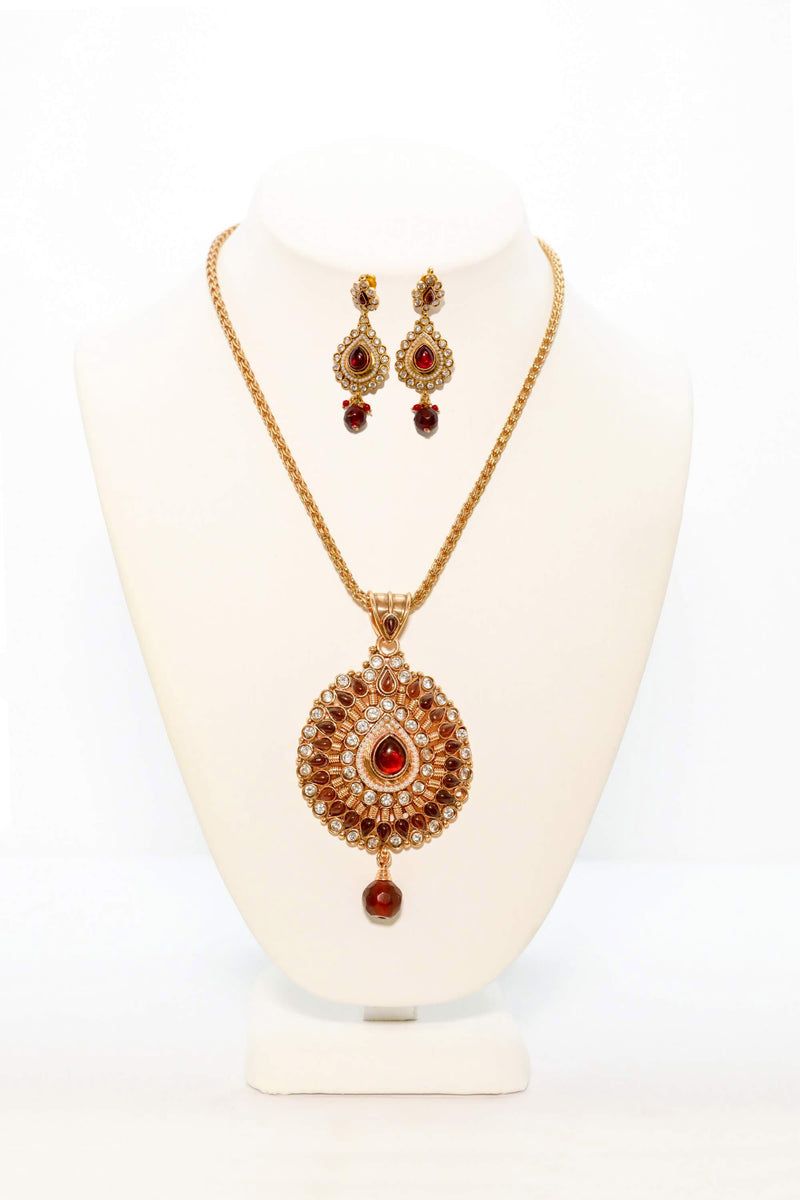 Gold Pendant With Ruby Red Stones - South Asian Fashion & Unique Home Decor